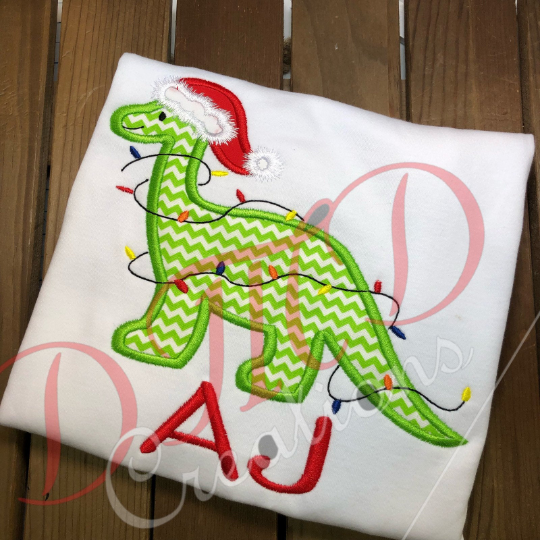 Dinosaur Wrapped in Lights Shirt, Dinosaur Christmas Shirt - DMDCreations